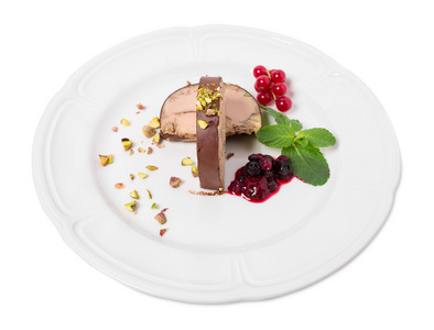 美味的鹅肝酱,覆盖着黑巧克力照片