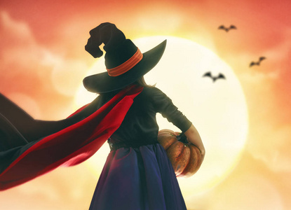 可爱的小巫婆与南瓜.儿童女孩户外照片