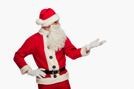 圣诞老人指向标志与孤立在白色背景上的微笑