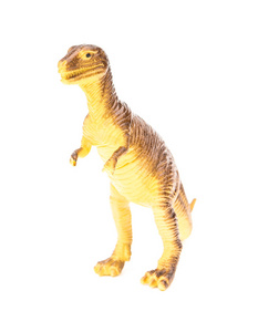 在白色背景上的棕色塑料恐龙玩具