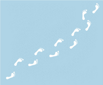 雪人脚印在雪地上.大脚步行照片