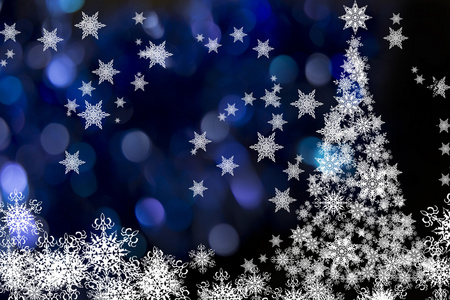 圣诞树在蓝色和黑色背景