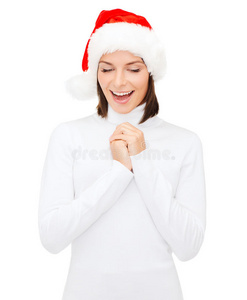 戴着圣诞帽的惊喜女人