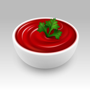 白碗的红色番茄酱番茄酱与绿色欧芹