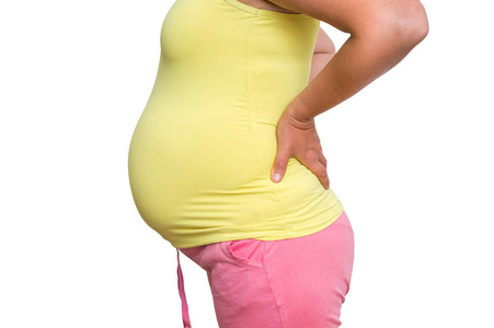 妊娠妇女背痛身体疼痛和怀孕的概念