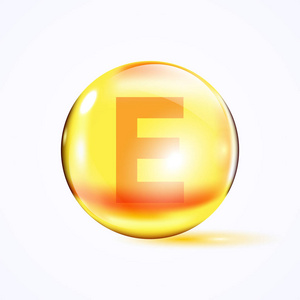 又闪亮彩色碗, 维生素 e, 黄色胶囊照片