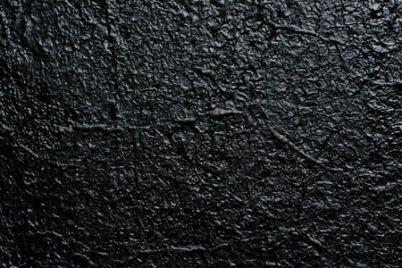 暗黑色光面漆墙的质感照片