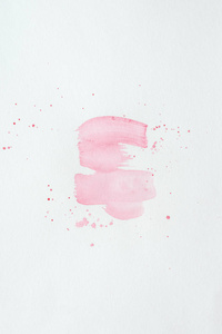 在白纸上用飞溅抽象浅粉色水彩笔画