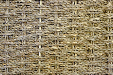 芦苇编织的垫。干的质地。浅黄色