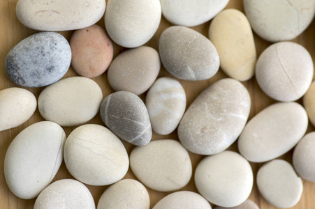 鹅卵石组浅色石背景圆形光滑鹅卵石简单和谐质感