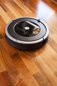 对强化木地板智能清洁 tec 的机器人真空吸尘器。