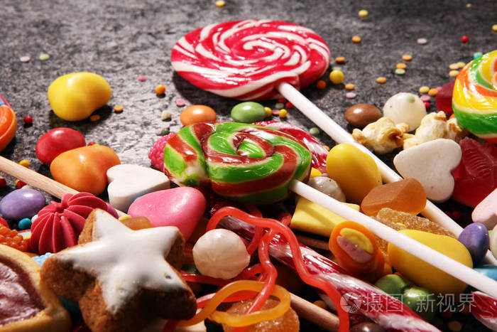 糖果加果冻和糖丰富多彩的不同孩子的糖果和治疗的数组