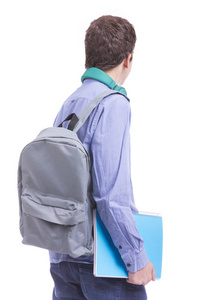 青少年学生携带教科书和背包
