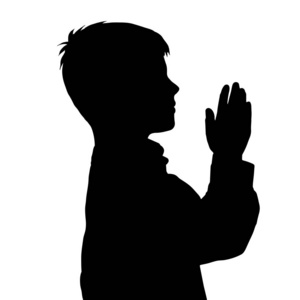 在白色背景祈祷的男孩向量剪影