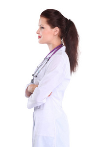 年轻女医生的画像, 白色大衣站在医院。年轻女医生肖像