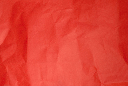 折痕的红纸背景图片