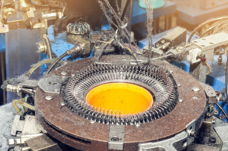 做袜子的针织机.螺纹,零件,服装生产照片