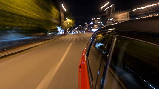 在城市的一条夜航大道上 在一条夜航大道上行驶 道路上的灯光在高速上反射在汽车上 现代城市的快速节奏照片 正版商用图片0tw5dr 摄图新视界 在城市的一条夜航大道上 在一条夜航大道上行驶 道路上的灯光在高速上反射在汽车上 现代城市的快速节奏照片 正版商用图片0tw5dr 摄图新视界