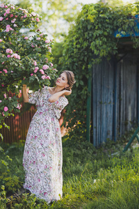 一个带着丁香花的布什的背景上的女孩1642年