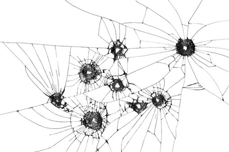 破裂窗户上的弹孔.碎玻璃照片
