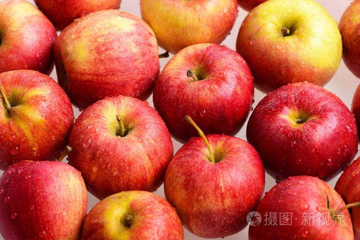苹果果实,在市场中的很多红苹果背景.