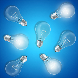 组灯灯泡在蓝色背景上用发光的灯泡。观念创新理念，3d 渲染