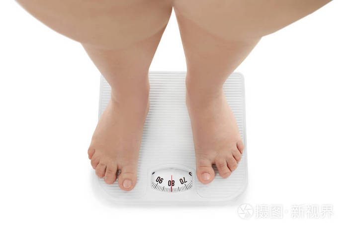 测量她的体重的胖女人照片-正版商用图片0u6gg2-摄图新视界