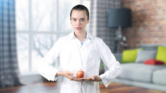 美丽的医学女医生穿制服。画室画背景。有利可图的保健的概念