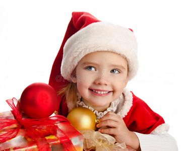 戴着圣诞帽的小女孩，带着礼品盒和舞会