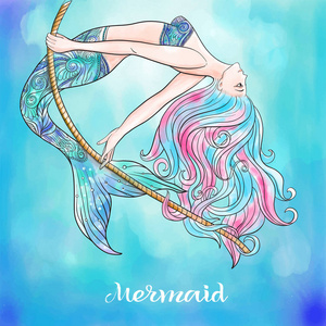 手绘美人鱼在绳索上水彩背景上荡秋千照片