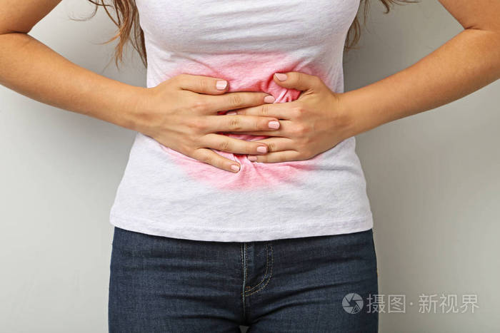 胃疼的女人照片-正版商用图片0ue0zk-摄图新视界