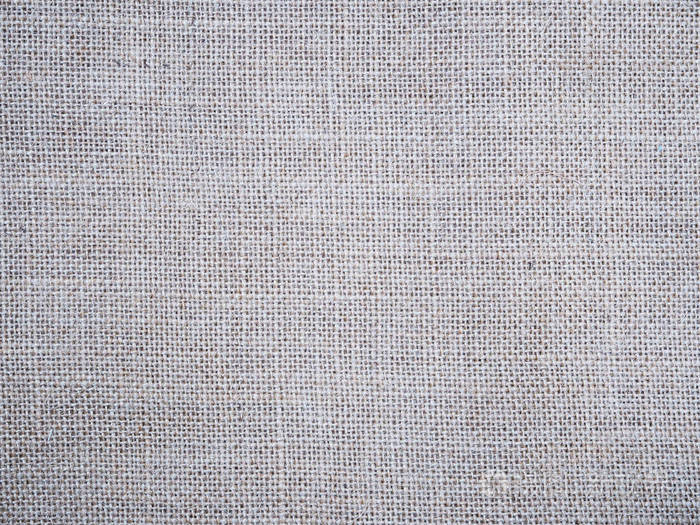 米色粗花呢面料肌理作为背景