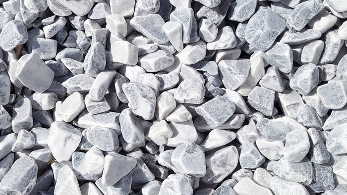 人行道或墙上小石块的灰色无缝瓷砖背景