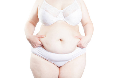 丰满的女人在胃里有一叠多余的脂肪 大于