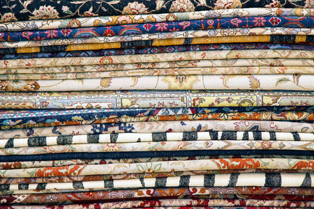 彩色埃及国家地毯堆特写图片