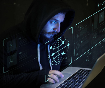 黑客的人使用笔记本电脑在黑暗的房间, 手上 toucpad, 霓虹灯世界的图标