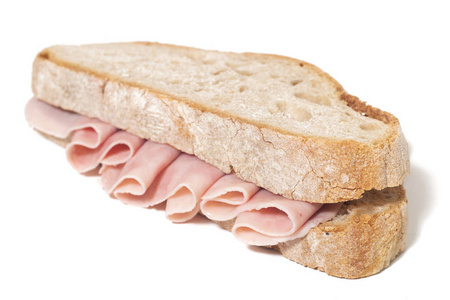 美味的三明治与火腿在白色背景