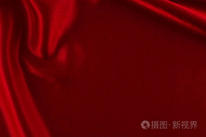 抽象丝绸豪华背景一块布深红色布料纹理