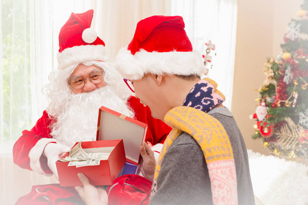 圣诞老人赠送礼物给人圣诞前夕, 圣诞节的概念