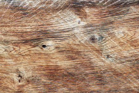 在褐色色调的树木抛光切割的纹理。锯木板的切口。天然建筑材料。家具制造。房舍的装修和设计。室内菲尼斯