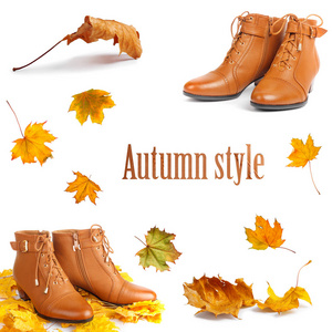 一对棕色女性靴子与明亮的秋天叶子隔绝在白色背景上