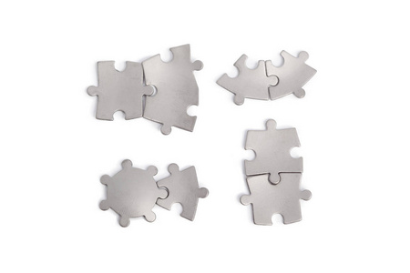 白色的金属拼图片照片