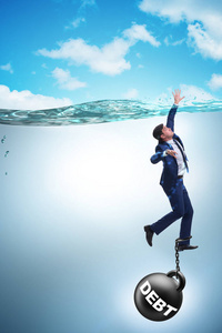 商人沉溺于高负债概念照片