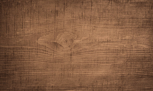 棕色深抓木制切菜板。木材纹理