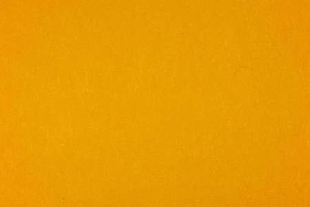 深黄色纸张背景纹理照片