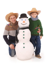 父亲和儿子一起雪人围巾和帽子