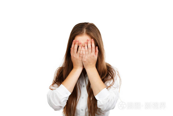 商业女人用她的双手蒙住了脸