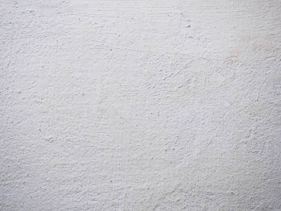 腻子的纹理.白墙身涂渍和滴在一个表面的特写镜头.