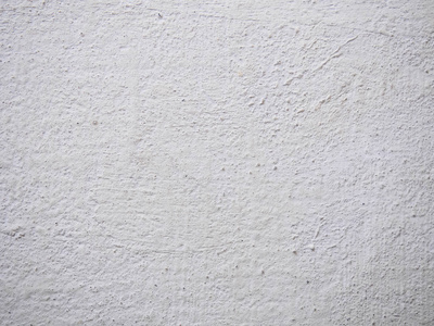 腻子的纹理.白墙身涂渍和滴在一个表面的特写镜头.