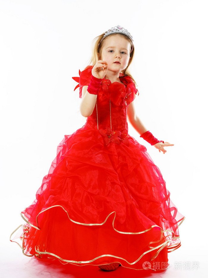 可爱的小公主穿红色的衣服与冠上她头的位置照片-正版商用图片0v9u0c
